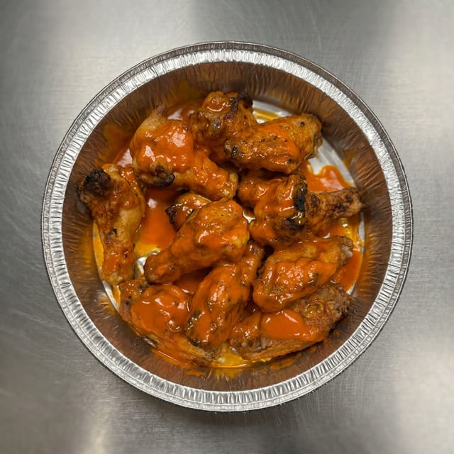 Baked Jumbo Sized Wings (10) - Lightly Breaded.